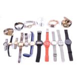 A large group of assorted watches with makes including Santos, Credit Suisse, Bench, Ingersoll, M