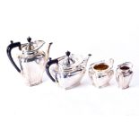 An Edwardian silver matching tea and coffee set London 1902, by Goldsmiths & Silversmiths Co Ltd, to