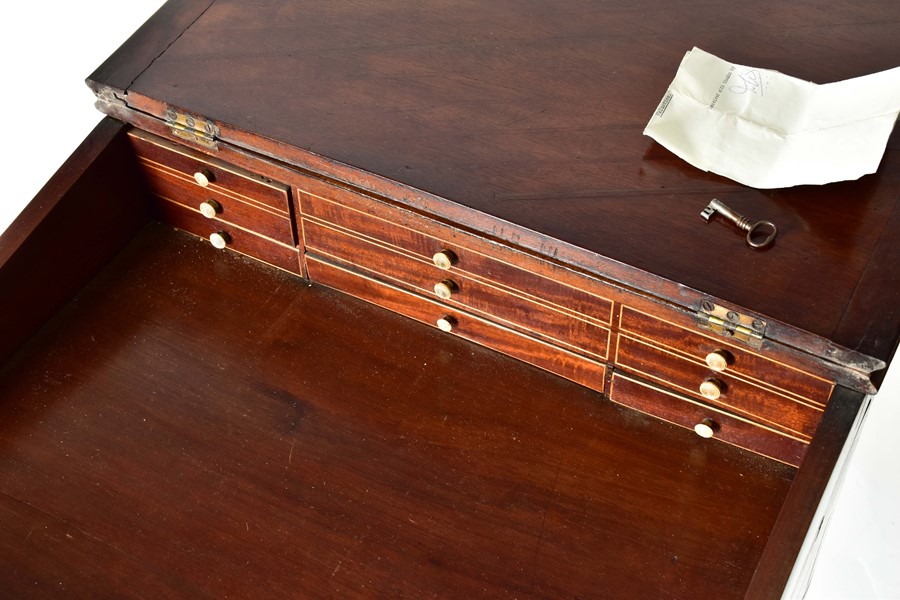 A George III 'Davenport' style writing desk of small proportions the sloping lid enclosing a bank of - Image 3 of 7