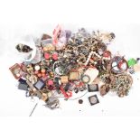 A large quantity of costume jewellery including various beaded necklaces, bracelets, white metal and