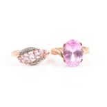 A 9ct yellow gold and pink synthetic spinel ring set with a mixed oval-cut topaz, measuring