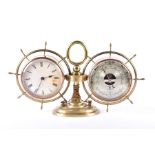 A 20th century brass and copper twin desk barometer and clock modelled with a nautical theme, 17