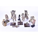 A collection of antique Indian brass ware items to include a pair of 19th century candlesticks