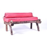 A late 19th / early 20th century Indian carved hardwood bench the detailed frieze and terminus