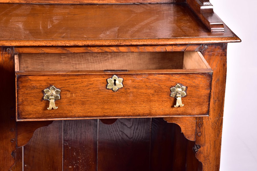 A large 18th century style oak dresser the top with three shelves, on a base with two drawers and - Image 5 of 9