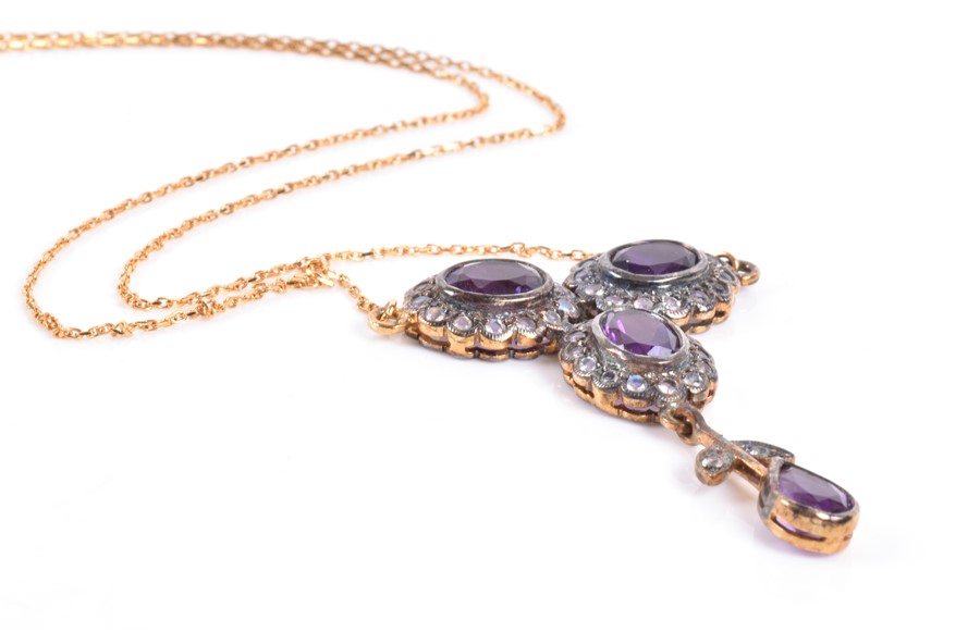 A silver gilt, amethyst, and white topaz drop pendant necklace set with three gemstone clusters - Image 2 of 4