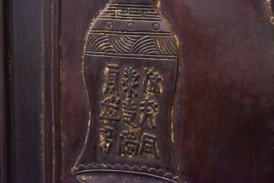 A pair of early 20th century Chinese hardwood cabinets with brass mounts, the panelled doors with - Image 5 of 18