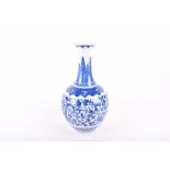A Chinese blue and white bottle vase most likely 20th century, the body painted with dragons,