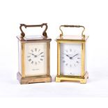 A Mappin & Webb gilt brass carriage clock (15 cm high), together with another example by Bayard. (