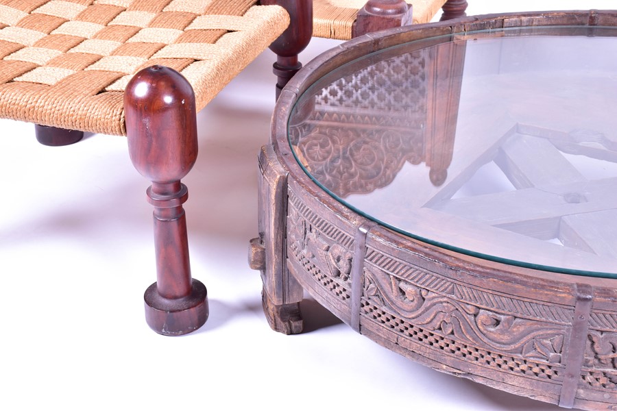 A pair of early 20th century Indian carved hardwood pida chairs, with rush seating, together with - Image 4 of 9