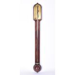 A George III mahogany stick barometer by George Adams  c.1780, with plain arched top over a brass