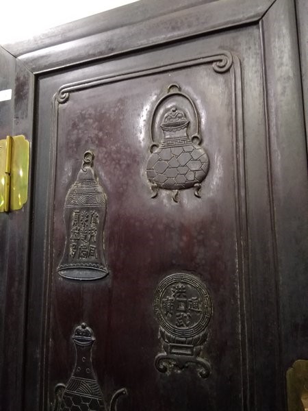 A pair of early 20th century Chinese hardwood cabinets with brass mounts, the panelled doors with - Image 16 of 18