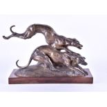 An Art Deco silvered bronze group of two running hounds by Francisque circa 1930, the dogs