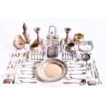 A large quantity of mixed English and Continental silver to include cruets, toast racks, a