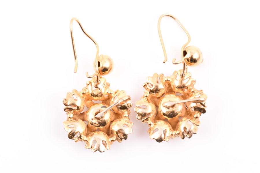 A pair of 14ct yellow gold and diamond floral cluster earrings each set with seven mixed-cut - Image 3 of 3