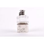 Tiffany & Co. A silver mounted glass hip flask the bottle with engraved line decoration, the