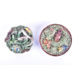 Two Portuguese Palissy style small wall plaques each decorated with various reptiles, insects and