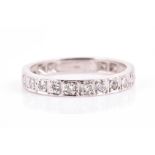 An 18ct white gold and diamond half eternity ring inset with eleven round brilliant-cut diamonds