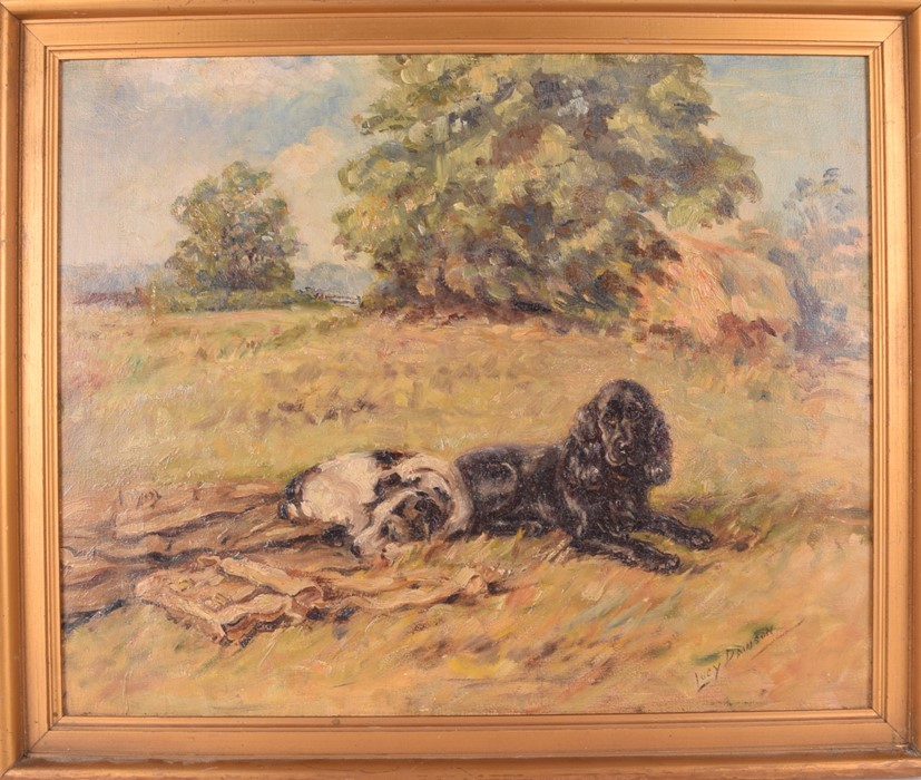 Lucy Dawson (1875-1954) British A spaniel and a terrier in a field, oil on board, signer lower