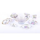 A group of small Herend porcelain items to include a cup and saucer, a twin-handled basket, pin