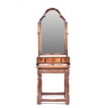 A 19th century walnut dressing table mirror with shaped top and three small drawers, together with