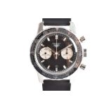 A rare 1967 Heuer Autavia stainless ref. 7763 steel mechanical chronograph wristwatch the black dial