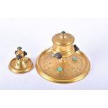 A Victorian ormolu and malachite desk set comprising an inkwell and a small stand, decorated with