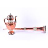 A 19th century Indian copper and silvered brass mounted tea kettle together with a similarly