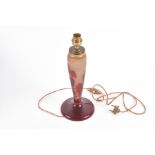 After Emile Galle (1846-1904) French an Art Nouveau cameo glass lamp with red vine leaf foliage, the