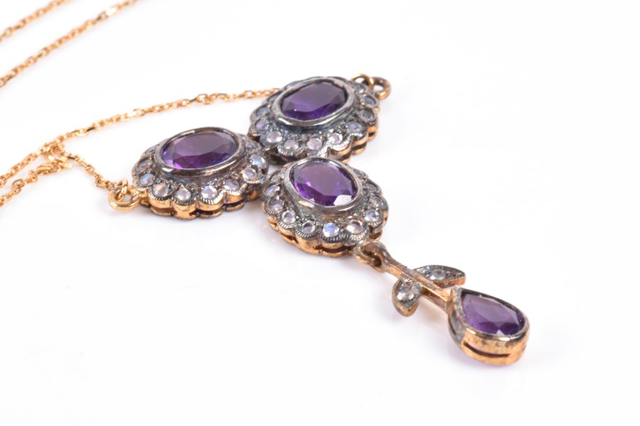 A silver gilt, amethyst, and white topaz drop pendant necklace set with three gemstone clusters - Image 4 of 4