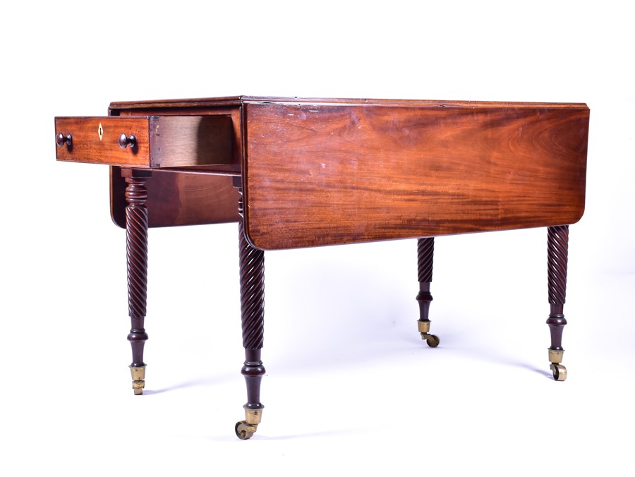 A Victorian mahogany Pembroke table with frieze drawers at either end, on spiral-twist turned legs