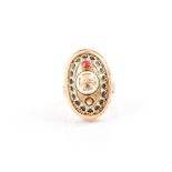 An unusual yellow gold and enamel ring the raised oval mount decorated with a Maltese cross,