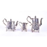 A Victorian style silver-plated three-piece tea set comprising teapot, hot water pot and milk jug,