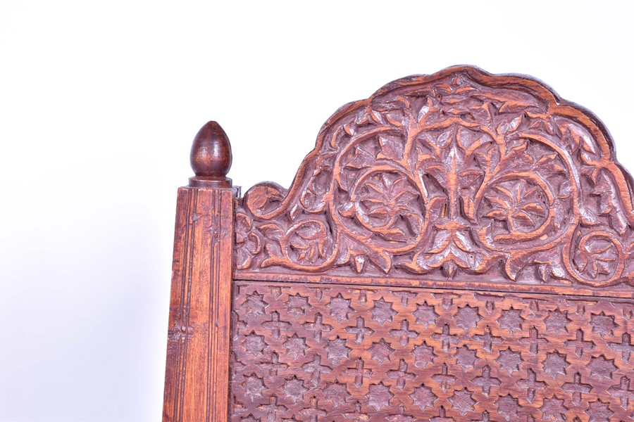 A pair of early 20th century Indian carved hardwood pida chairs, with rush seating, together with - Image 2 of 9