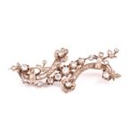 A late 19th / early 20th century rose gold and diamond brooch set with old-cut diamonds in a