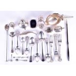 A mixed group of silver items to include cruet sets, a sugar sifter, flatware, a candle snuffer