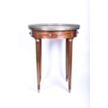 A French 19th century circular walnut occasional table with red veined marble top and pierced