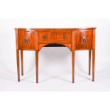 A George III style mahogany inlaid sideboard  fitted with a single central drawer flanked by two