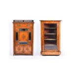 A Victorian walnut and inlaid music cabinet with glazed door and shelved interior, on four ceramic