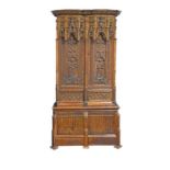 An impressive 19th century Gothic revival oak cupboard in the 15th century French style, with