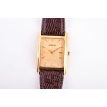 A Gucci 18ct yellow gold quartz wristwatch the gilt dial with baton indices and slim hands, in a