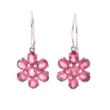 A pair of 9ct white gold and pink tourmaline floral drop earrings set with clusters of mixed oval-