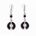A pair of 18ct white gold, diamond, and black onyx drop earrings in the Art Deco style, the
