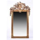 A French 18th century giltwood and gesso wall mirror possibly Louis XVI, the rectangular plate