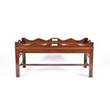 A George III style mahogany tray top coffee table the top with four panelled sections with inset