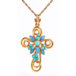 A yellow gold, turquoise, and enamel cross pendant the openwork cross of looped design, set with