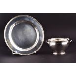 An Edwardian silver dish of plain form London 1912, maker's mark indistinct, 21 cm diameter,