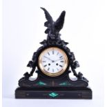 A late 19th century slate and bronze mounted mantel clock with malachite inlay the circular enamel