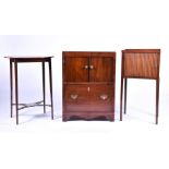 A George III mahogany commode with twin cupboard doors over a single draw, brass mounted, the