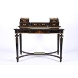 An Aesthetic Movement ebonised desk with raised upper structure fitted with five drawers, shagreen